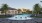 a swimming pool in front of a building
