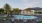 a pool with chairs around it