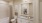 a bathroom with a sink toilet and mirror